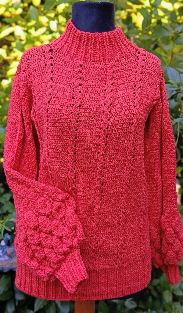 Producto - Sweater coral con mangas globo
