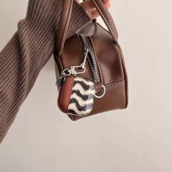 Producto - Case for airpods brown rayitas - 0