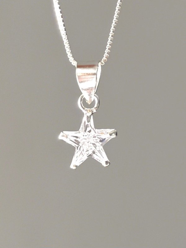 Producto - Dije estrella cubic