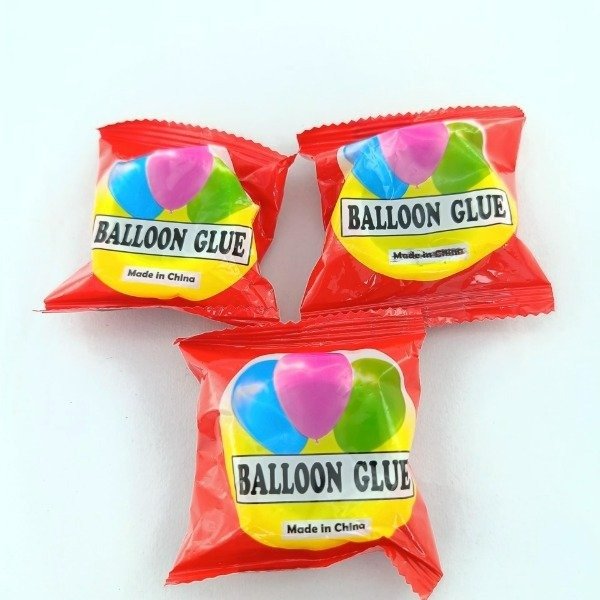 Producto - Pegamento  para Globo en BOLSITA ROJA X100