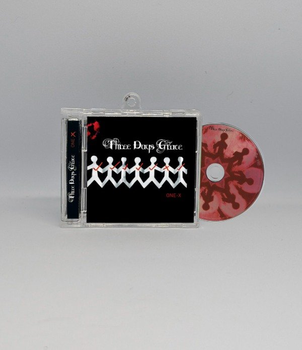 Producto - One-X - Llavero CD