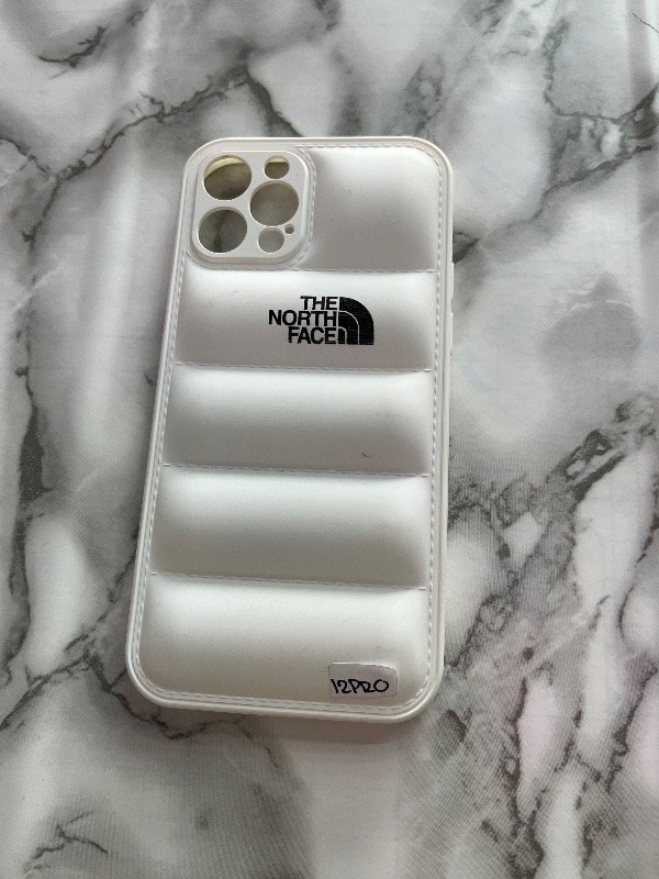 Producto - Funda puffer the north face ip 12 pro