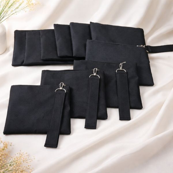 Producto - 5 Neceseres y llavero desmontable. Tela cordura. 24x17 cm