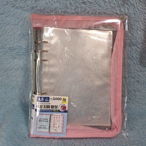 Producto - Binder Rosa A5 con folios de 1 bolsillo