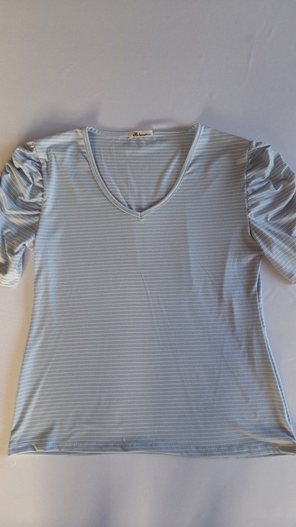 Producto - Remera Muñeca