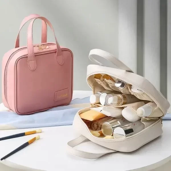 Producto - Neceser simil cuero tipo bolsito con manija 19x22