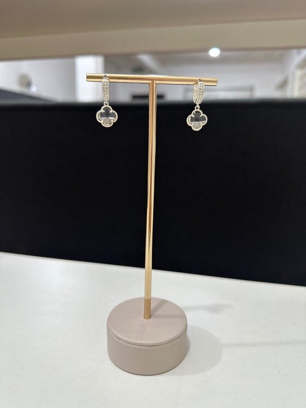 Producto - Argollas van cleef trasparente plata 925