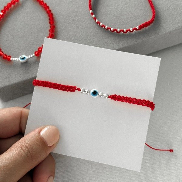 Producto - Pulsera trenzada con ojito (bolitas de plata)