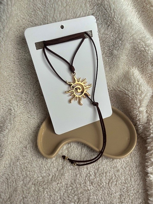 Producto - Choker gamuza sol dorado - chocolate