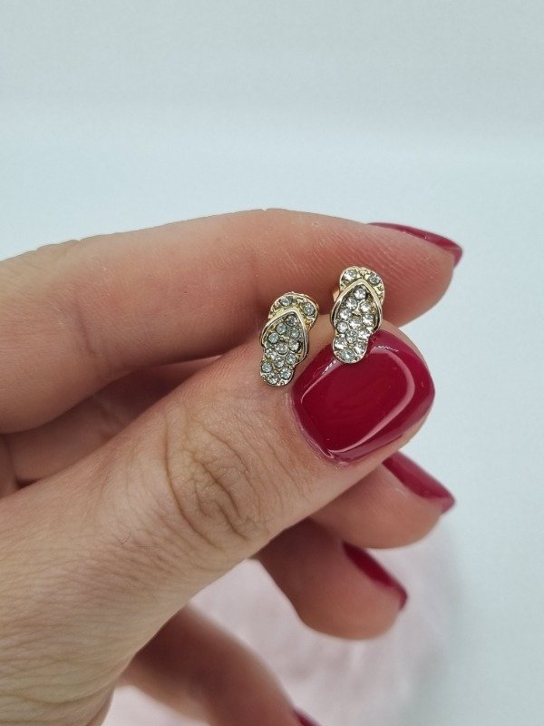 Producto - Aros acero dorado pasante ojotitas strass