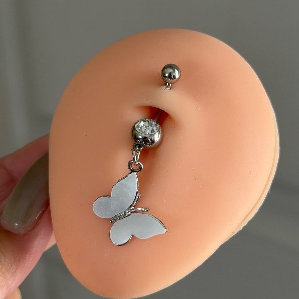 Producto - Piercing de ombligo colgante: Mariposa blanca
