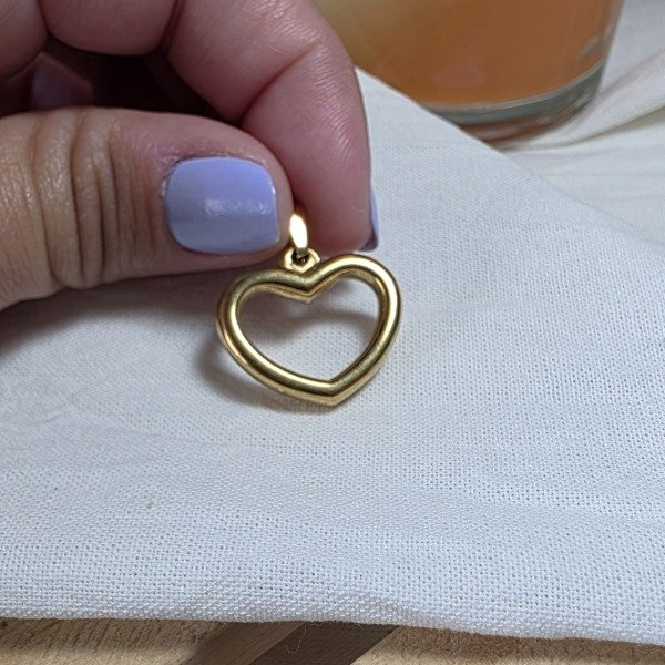 Producto - Dije Ac.Dorado corazón calado liso
