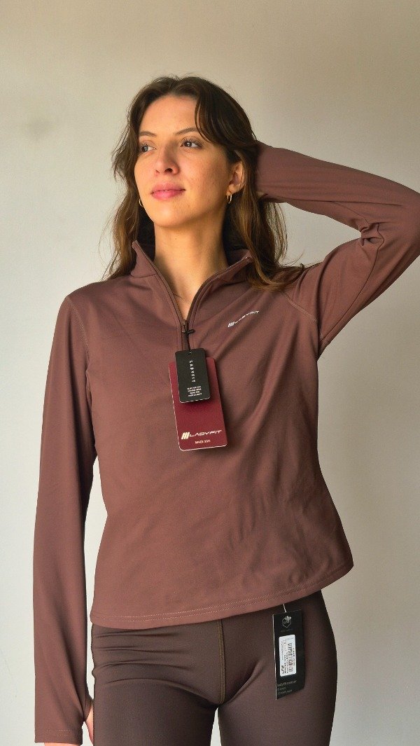 Producto - REMERA ZIP CHOCOLATE