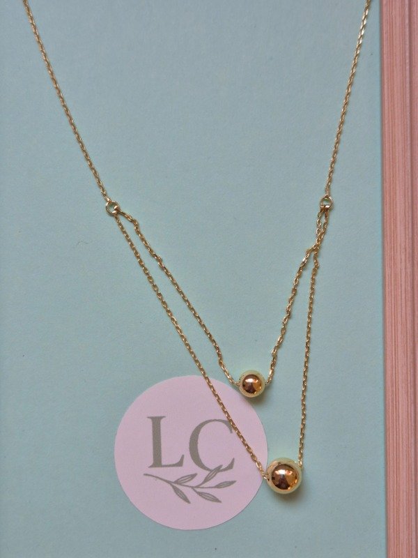 Producto - Collar doble dije bolitas dorado