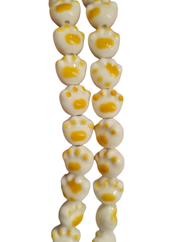 Producto - CUENTAS PATITAS DE CERÁMICA