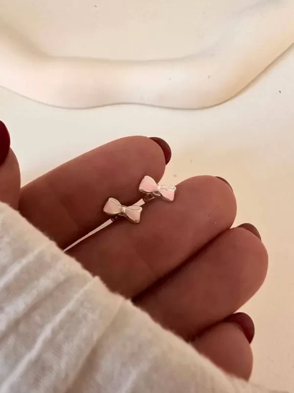 Producto - Aros abridores moñito rosa