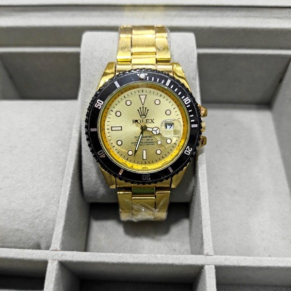 Producto - ROLEX DORADO BISEL NEGRO C/ DORADO