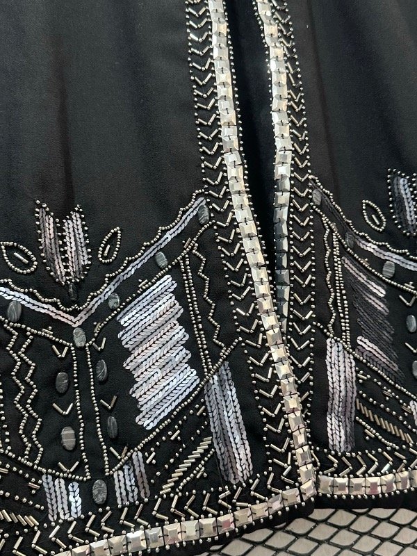 Producto - Saco de fiesta nuevo TS - 2