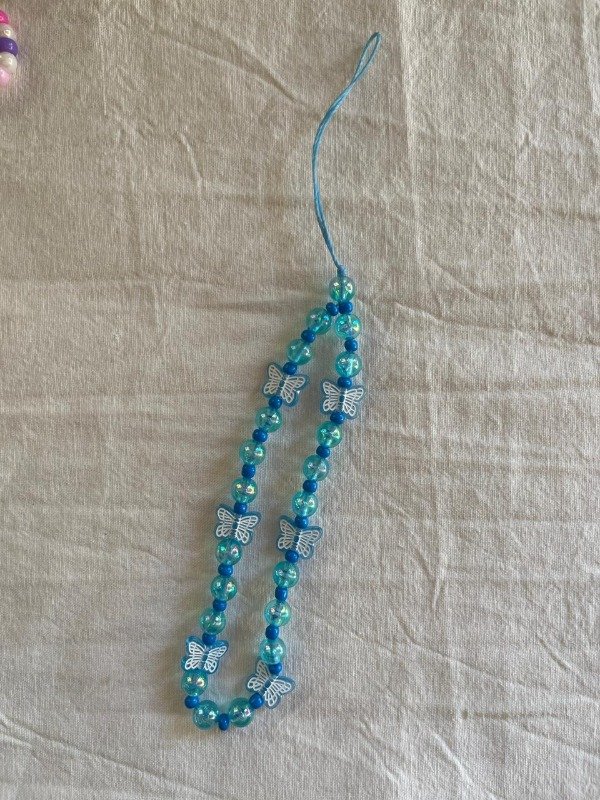 Producto - straps para colgar mariposas celestes