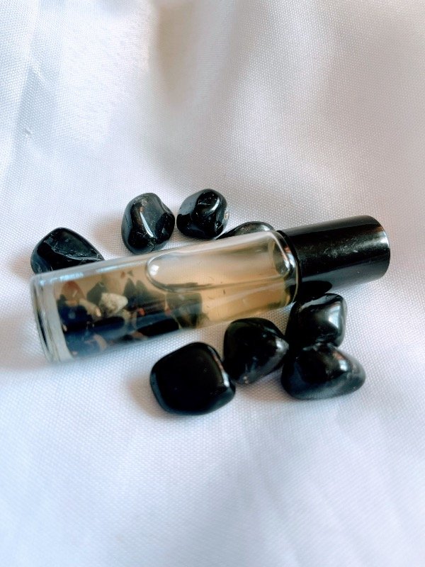 Producto - PERFUME FLUIR" - Chakra Raíz -  Protege, enraíza, confianza- - 1