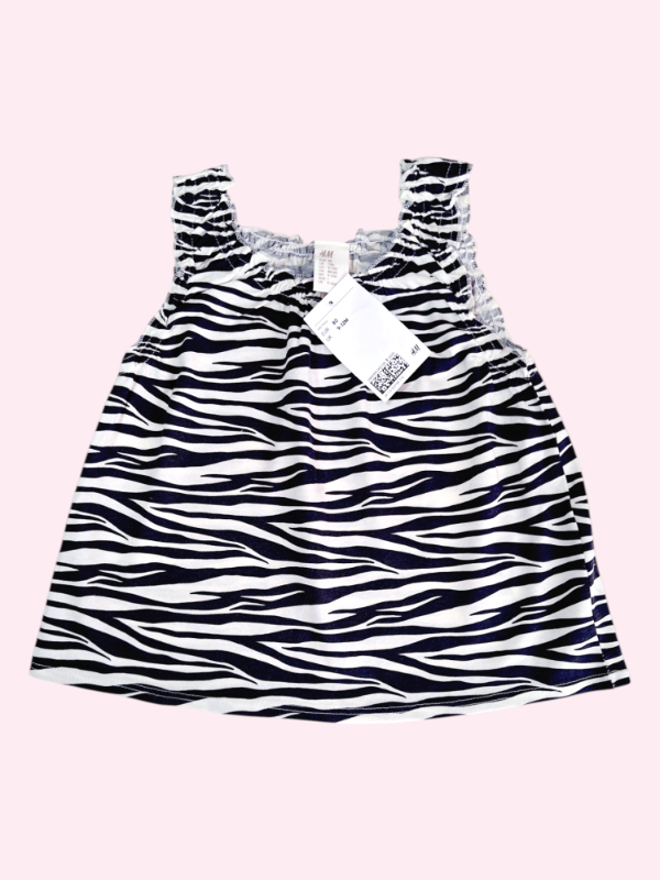 Producto - Musculosa animal print blanca y negro HYM 12 meses NUEVA