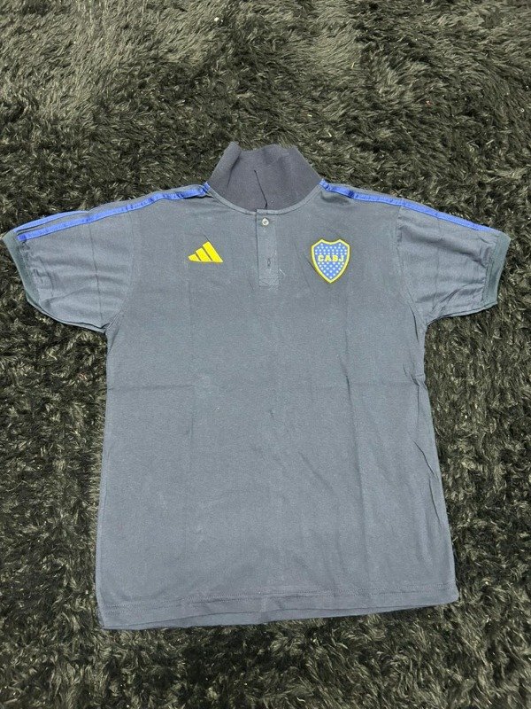 Producto - CHOMBA BOCA AZUL