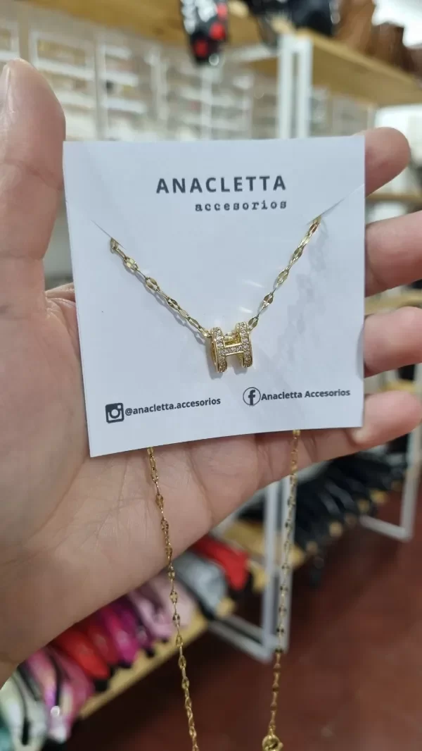 Producto - Gargantilla acero dorado con detalles en strass