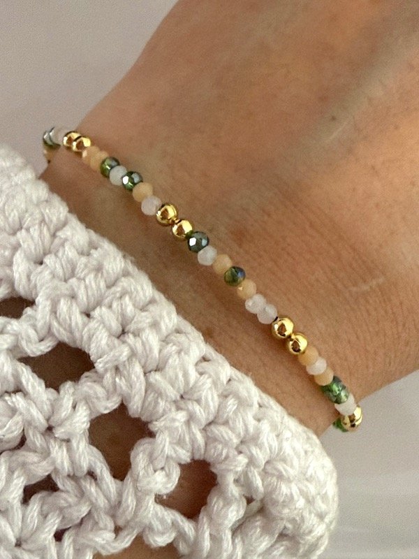 Producto - PD114 Pulsera piedritas y bolitas acero dorado