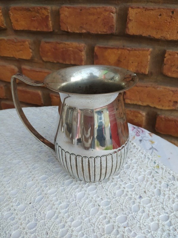 Producto - Jarra con desgaste en el baño