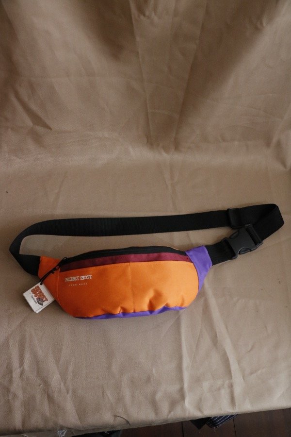 Producto - Riñonera naranja bordo violeta