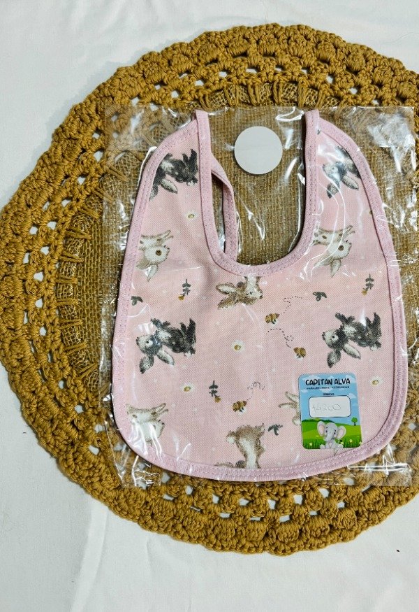 Producto - Babero con tela impermeable - conejos - rosa