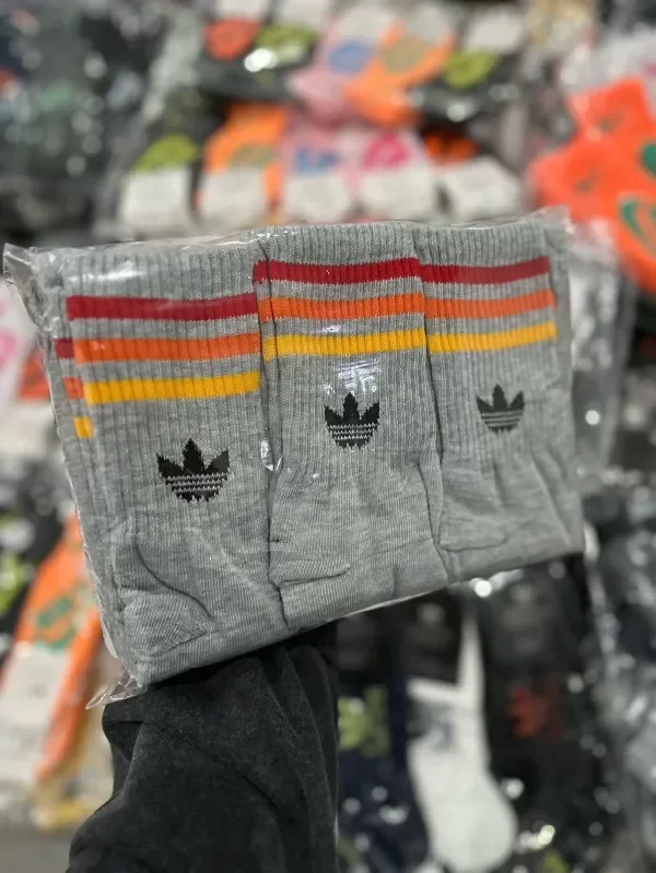 Medias 3/4 adidas gris con rayas
