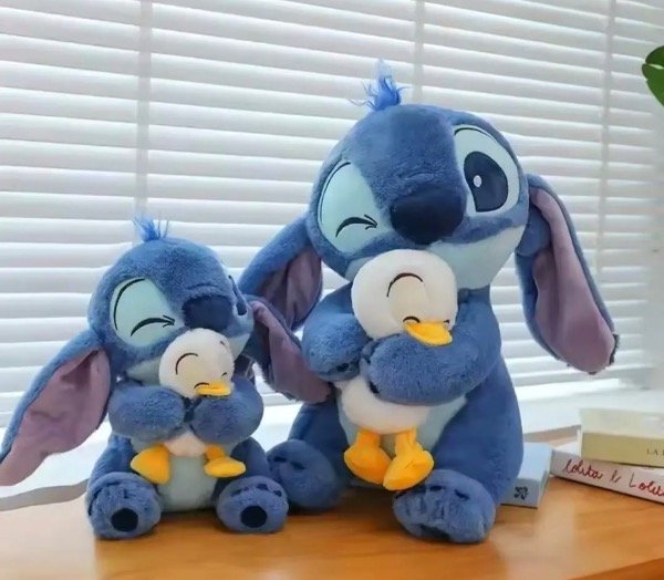 Producto - Peluche Stitch 30Cm Con Pato Suave Hermoso Importado color azul