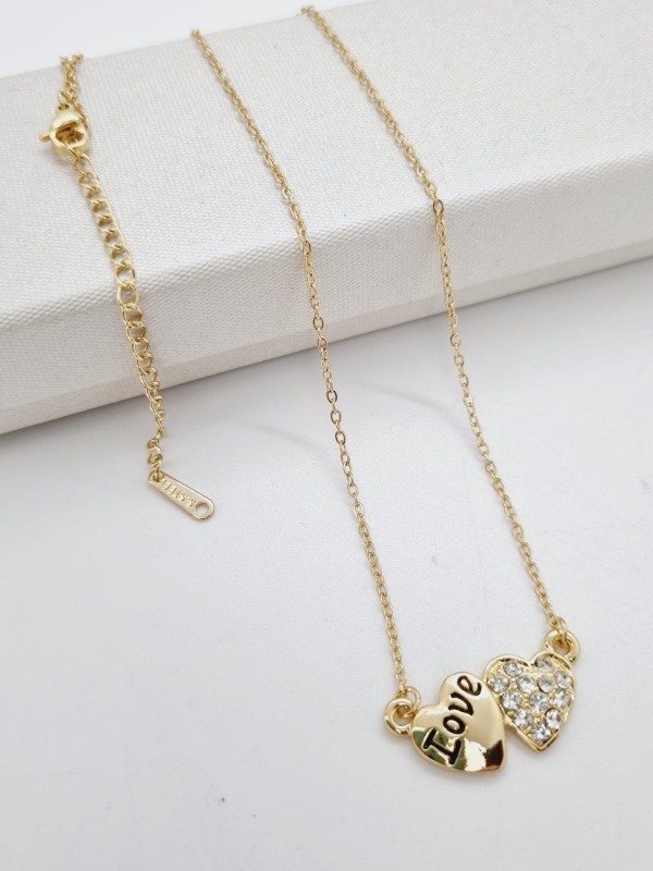 Producto - Cadena acero dorado fina dije doble corazon love/strass