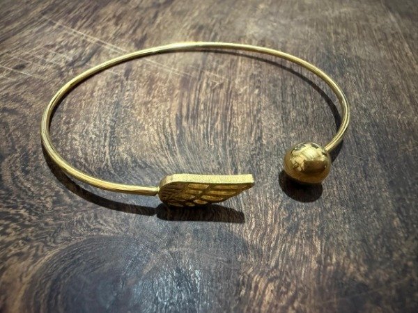 Producto - PULSERA CON ALA Y ESFERA
