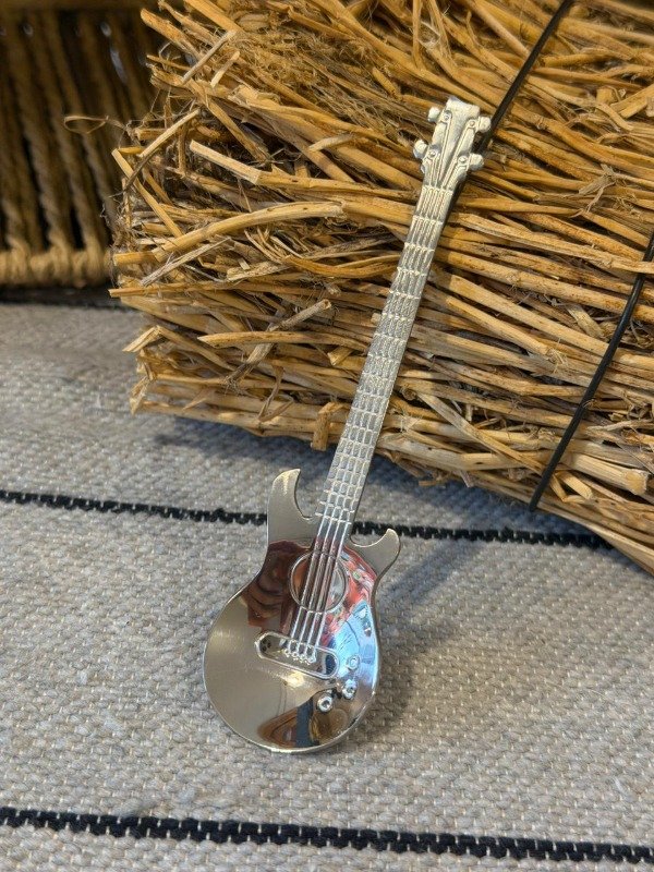 Producto - Cuchara de Guitarra (Efectivo: 3.120)