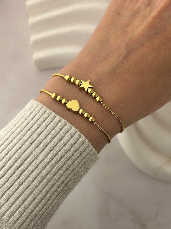 Producto - PULSERA DORADA CON DIJE Y BOLITAS 2390