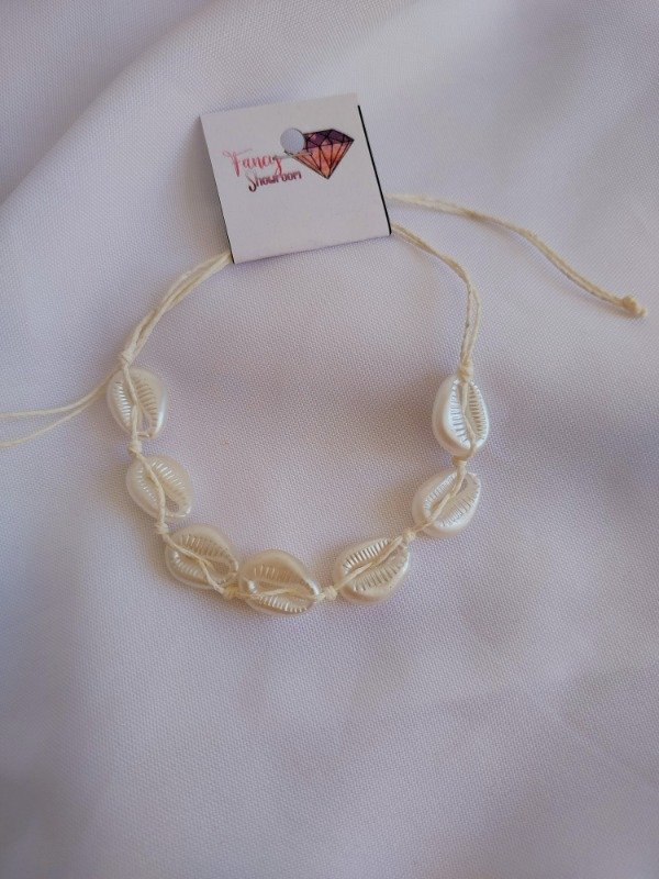 Producto - Tobillera blanca caracoles