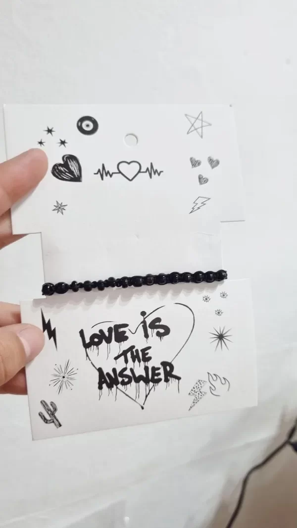 Producto - Pulsera/tobillera regulable negra con mostacillas