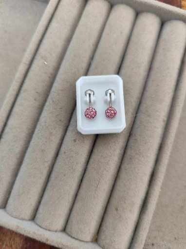 Producto - Aros abridores bolita de fuego rosa. Acero quirúrgico.