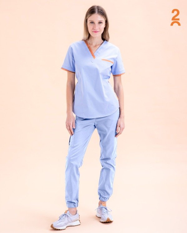 Producto - KATMANDÚ FLEX SPANDEX Celeste con detalle naranja