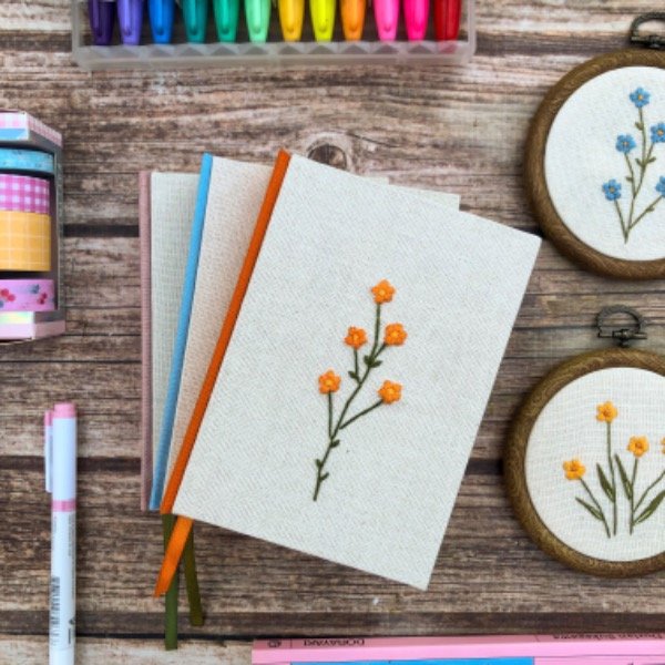 Producto - Cuaderno pocket  florcitas naranjas