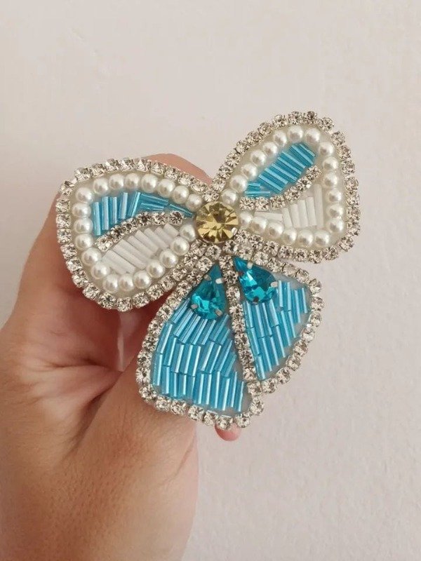 Producto - ESCARAPELA TINOGASTA