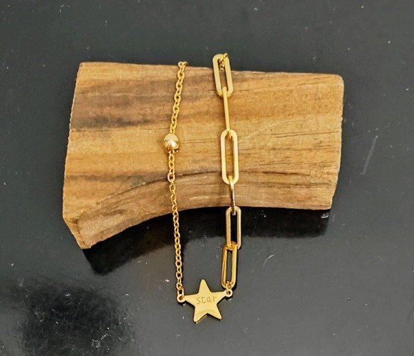 Producto - Pulsera cadenas diferentes con pelotita y dije central estrella