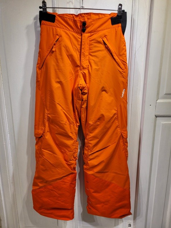 Producto - Pantalón de ski WEDZE naranja Con trampa de nieve Talle 10 años - PRECIO: 108X