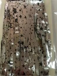 Producto - CORTINAS METALIZADAS CON ESTRELLAS NEGRAS