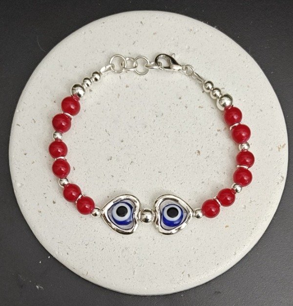Producto - Pulsera Piedras Cristal Rojas con dos Corazones con Ojitos Azules