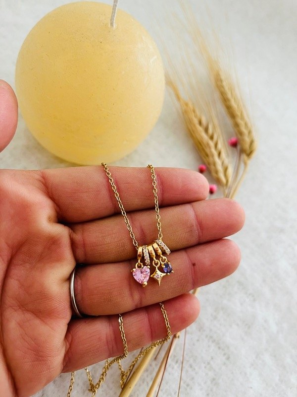 Producto - Cadena con dijes cubic acero dorado