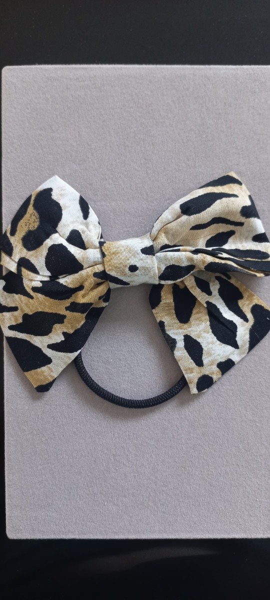 Producto - Moño colita animal print colita