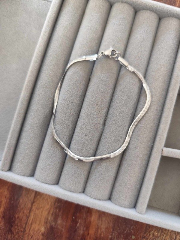 Producto - Pulsera plana grosor S. Acero quirúrgico.